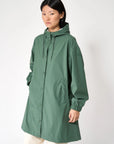 Mis Raincoat in Dark Forest