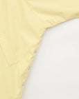 Sky Raincoat in Pale Banana