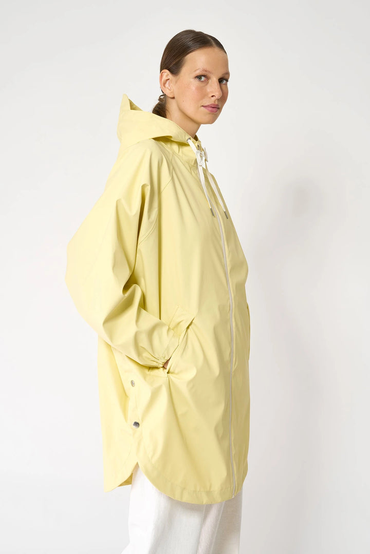 Sky Raincoat in Pale Banana