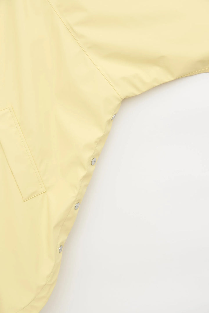 Sky Raincoat in Pale Banana